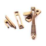 This is an image showing From The Anvil - Polished Bronze Locking Reeded Fastener available from T.H Wiggans Architectural Ironmongery in Kendal, quick delivery and discounted prices