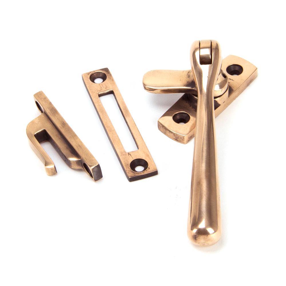 This is an image showing From The Anvil - Polished Bronze Locking Newbury Fastener available from T.H Wiggans Architectural Ironmongery in Kendal, quick delivery and discounted prices