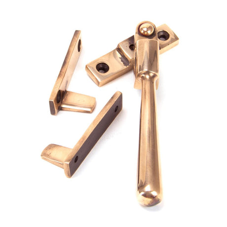 This is an image showing From The Anvil - Polished Bronze Night-Vent Locking Newbury Fastener available from T.H Wiggans Architectural Ironmongery in Kendal, quick delivery and discounted prices