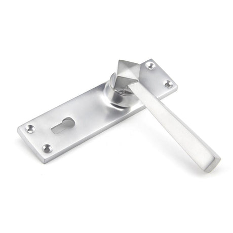 This is an image showing From The Anvil - Satin Chrome Straight Lever Lock Set available from trade door handles, quick delivery and discounted prices