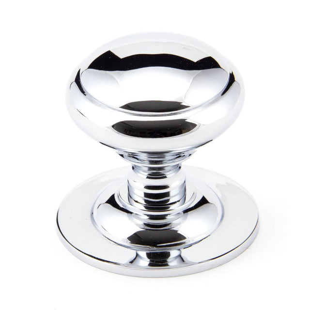 This is an image of From The Anvil - Polished Chrome Round Centre Door Knob available to order from T.H Wiggans Architectural Ironmongery in Kendal, quick delivery and discounted prices.