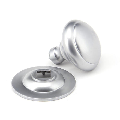 This is an image showing From The Anvil - Satin Chrome Round Centre Door Knob available from trade door handles, quick delivery and discounted prices