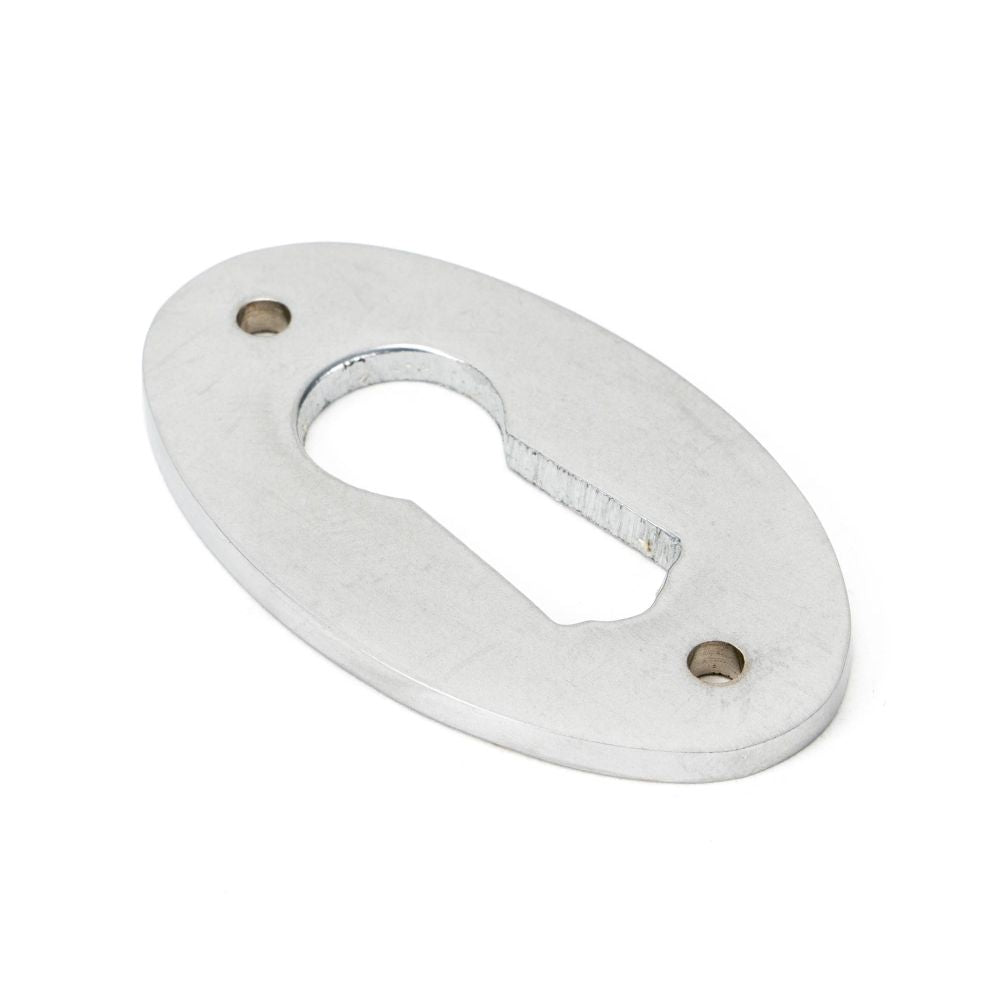 This is an image of From The Anvil - Satin Chrome Oval Escutcheon available to order from T.H Wiggans Architectural Ironmongery in Kendal, quick delivery and discounted prices.