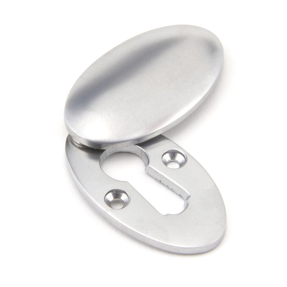 This is an image of From The Anvil - Satin Chrome Oval Escutcheon & Cover available to order from T.H Wiggans Architectural Ironmongery in Kendal, quick delivery and discounted prices.