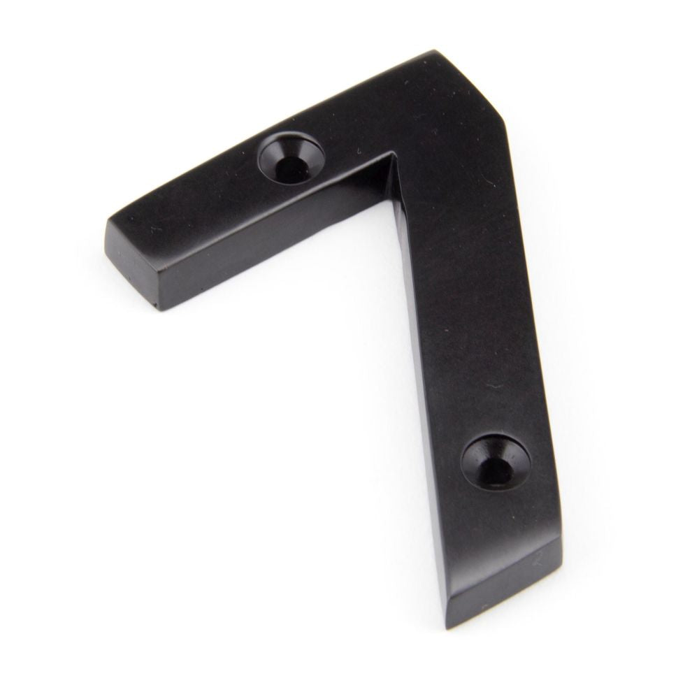 This is an image of From The Anvil - Aged Bronze Numeral 7 available to order from T.H Wiggans Architectural Ironmongery in Kendal, quick delivery and discounted prices.