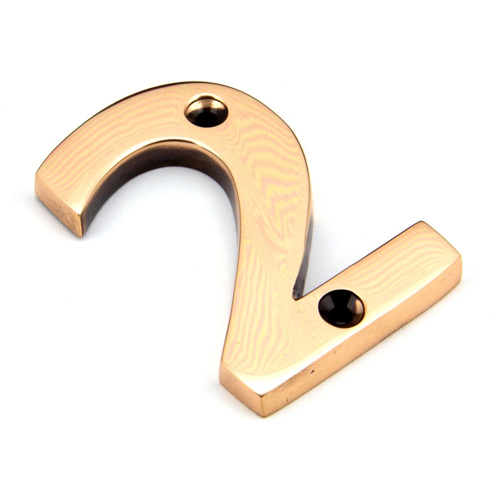 This is an image of From The Anvil - Polished Bronze Numeral 2 available to order from T.H Wiggans Architectural Ironmongery in Kendal, quick delivery and discounted prices.