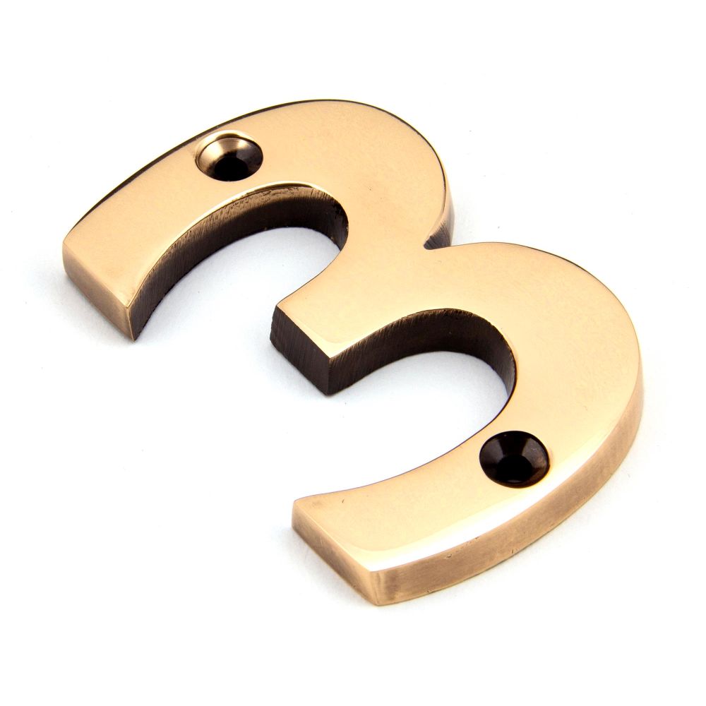 This is an image of From The Anvil - Polished Bronze Numeral 3 available to order from T.H Wiggans Architectural Ironmongery in Kendal, quick delivery and discounted prices.