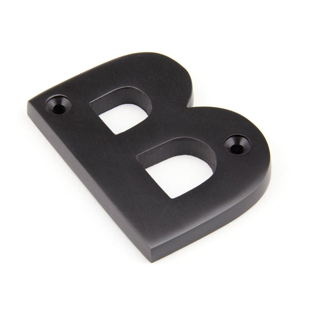 This is an image of From The Anvil - Aged Bronze Letter B available to order from T.H Wiggans Architectural Ironmongery in Kendal, quick delivery and discounted prices.