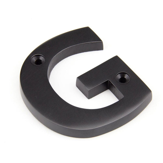 This is an image of From The Anvil - Aged Bronze Letter G available to order from T.H Wiggans Architectural Ironmongery in Kendal, quick delivery and discounted prices.