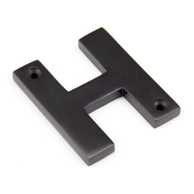 This is an image of From The Anvil - Aged Bronze Letter H available to order from T.H Wiggans Architectural Ironmongery in Kendal, quick delivery and discounted prices.
