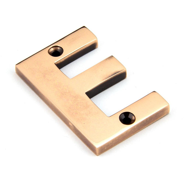 This is an image of From The Anvil - Polished Bronze Letter E available to order from T.H Wiggans Architectural Ironmongery in Kendal, quick delivery and discounted prices.