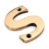 This is an image of From The Anvil - Polished Bronze Letter S available to order from T.H Wiggans Architectural Ironmongery in Kendal, quick delivery and discounted prices.