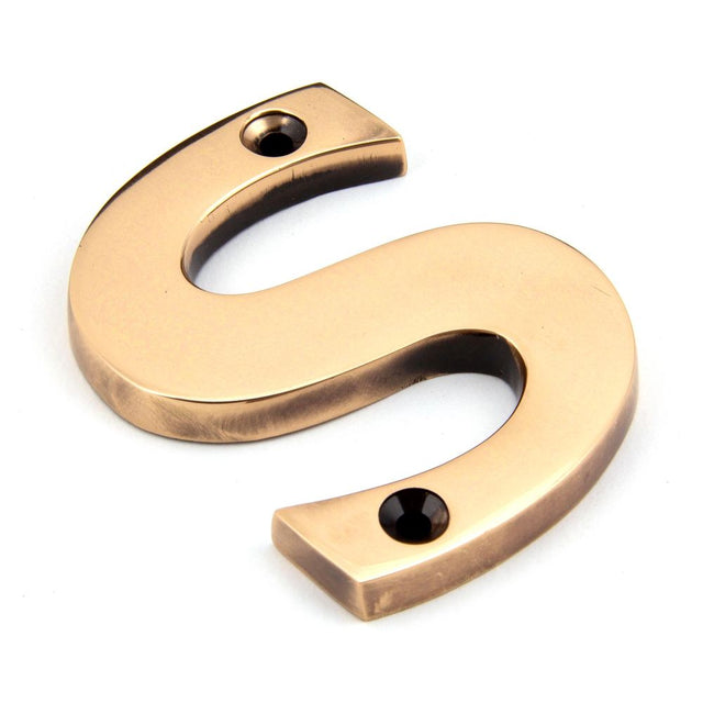 This is an image of From The Anvil - Polished Bronze Letter S available to order from T.H Wiggans Architectural Ironmongery in Kendal, quick delivery and discounted prices.
