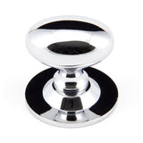 This is an image showing From The Anvil - Polished Chrome Oval Cabinet Knob 40mm available from T.H Wiggans Architectural Ironmongery in Kendal, quick delivery and discounted prices