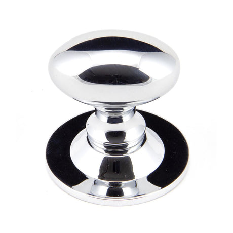 This is an image showing From The Anvil - Polished Chrome Oval Cabinet Knob 33mm available from T.H Wiggans Architectural Ironmongery in Kendal, quick delivery and discounted prices