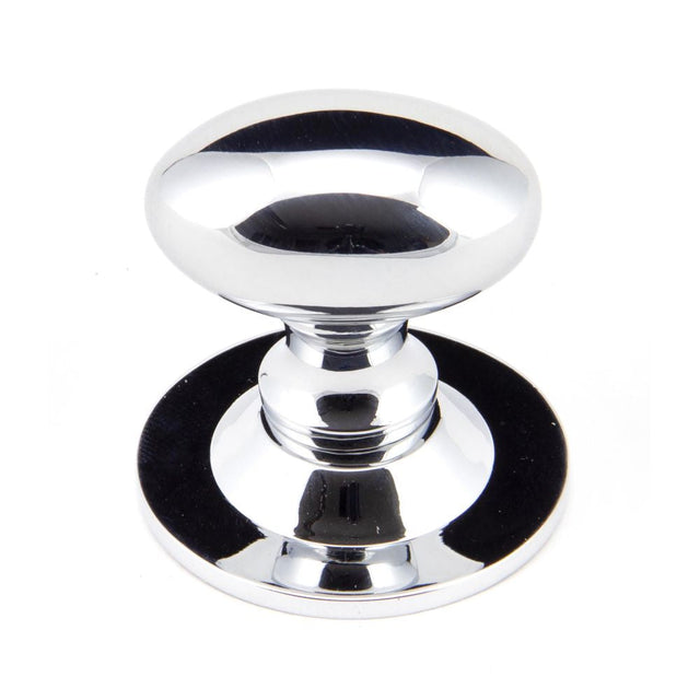 This is an image showing From The Anvil - Polished Chrome Oval Cabinet Knob 33mm available from T.H Wiggans Architectural Ironmongery in Kendal, quick delivery and discounted prices