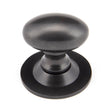 This is an image showing From The Anvil - Aged Bronze Oval Cabinet Knob 33mm available from T.H Wiggans Architectural Ironmongery in Kendal, quick delivery and discounted prices