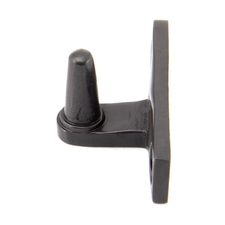 This is an image showing From The Anvil - Aged Bronze Cranked Stay Pin available from T.H Wiggans Architectural Ironmongery in Kendal, quick delivery and discounted prices