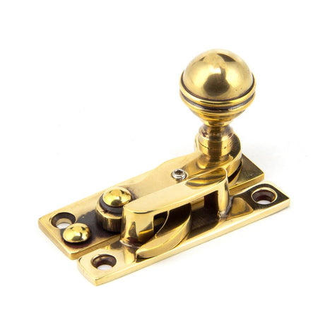 This is an image showing From The Anvil - Aged Brass Prestbury Sash Hook Fastener available from T.H Wiggans Architectural Ironmongery in Kendal, quick delivery and discounted prices