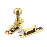 This is an image showing From The Anvil - Aged Brass Prestbury Sash Hook Fastener available from T.H Wiggans Architectural Ironmongery in Kendal, quick delivery and discounted prices