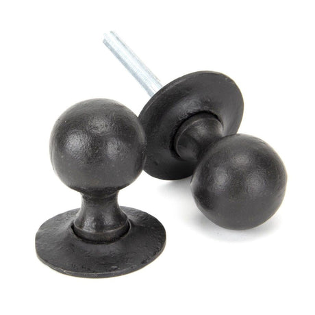 This is an image showing From The Anvil - External Beeswax Round Mortice/Rim Knob Set available from trade door handles, quick delivery and discounted prices