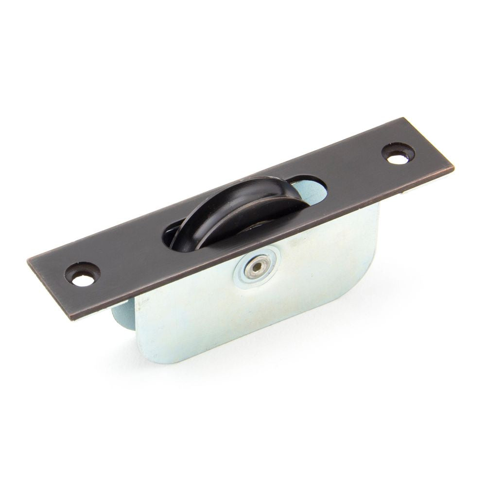 This is an image showing From The Anvil - Aged Bronze Square Ended Sash Pulley 75kg available from T.H Wiggans Architectural Ironmongery in Kendal, quick delivery and discounted prices