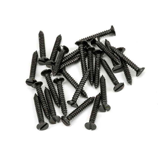 This is an image showing From The Anvil - Dark Stainless Steel 10x1?" Countersunk Screws (25) available from T.H Wiggans Architectural Ironmongery in Kendal, quick delivery and discounted prices