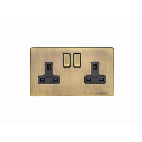 This is an image showing Eurolite Concealed 3mm 2 Gang Socket - Antique Brass (With Black Trim) ab2sob available to order from T.H. Wiggans Ironmongery in Kendal, quick delivery and discounted prices.