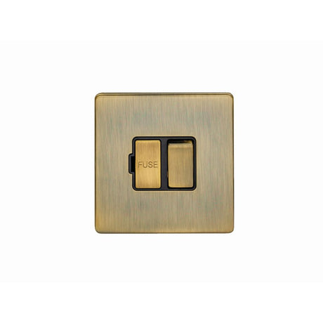 This is an image showing Eurolite Concealed 3mm Switched Fuse Spur - Antique Brass (With Black Trim) abswfb available to order from T.H. Wiggans Ironmongery in Kendal, quick delivery and discounted prices.