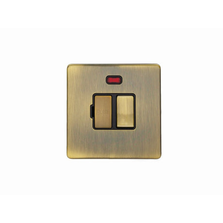 This is an image showing Eurolite Concealed 3mm Switched Fuse Spur - Antique Brass (With Black Trim) abswfnb available to order from T.H. Wiggans Ironmongery in Kendal, quick delivery and discounted prices.