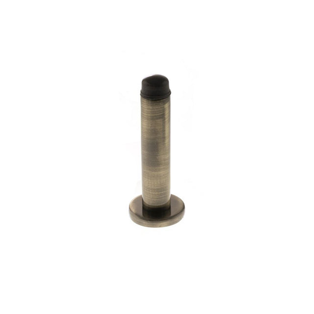 This is an image of Atlantic Premium Wall Mounted Door Stop on Concealed Fix Rose - Antique Brass available to order from T.H Wiggans Architectural Ironmongery in Kendal, quick delivery and discounted prices.