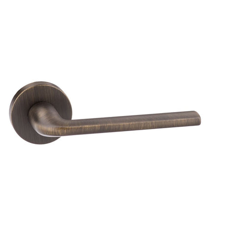 This is an image of Forme Milly Designer Lever on Minimal Round Rose - Urban Bronze available to order from T.H Wiggans Architectural Ironmongery in Kendal, quick delivery and discounted prices.