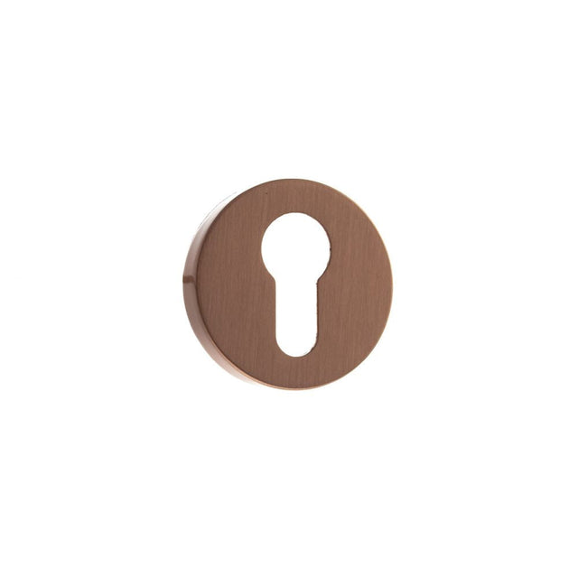 This is an image of Forme Euro Escutcheon on Minimal Round Rose - Urban Satin Copper available to order from T.H Wiggans Architectural Ironmongery in Kendal, quick delivery and discounted prices.