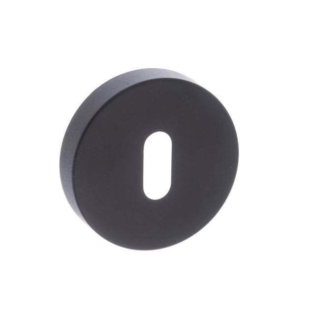 This is an image of Forme Key Escutcheon on Minimal Round Rose - Matt Black available to order from T.H Wiggans Architectural Ironmongery in Kendal, quick delivery and discounted prices.