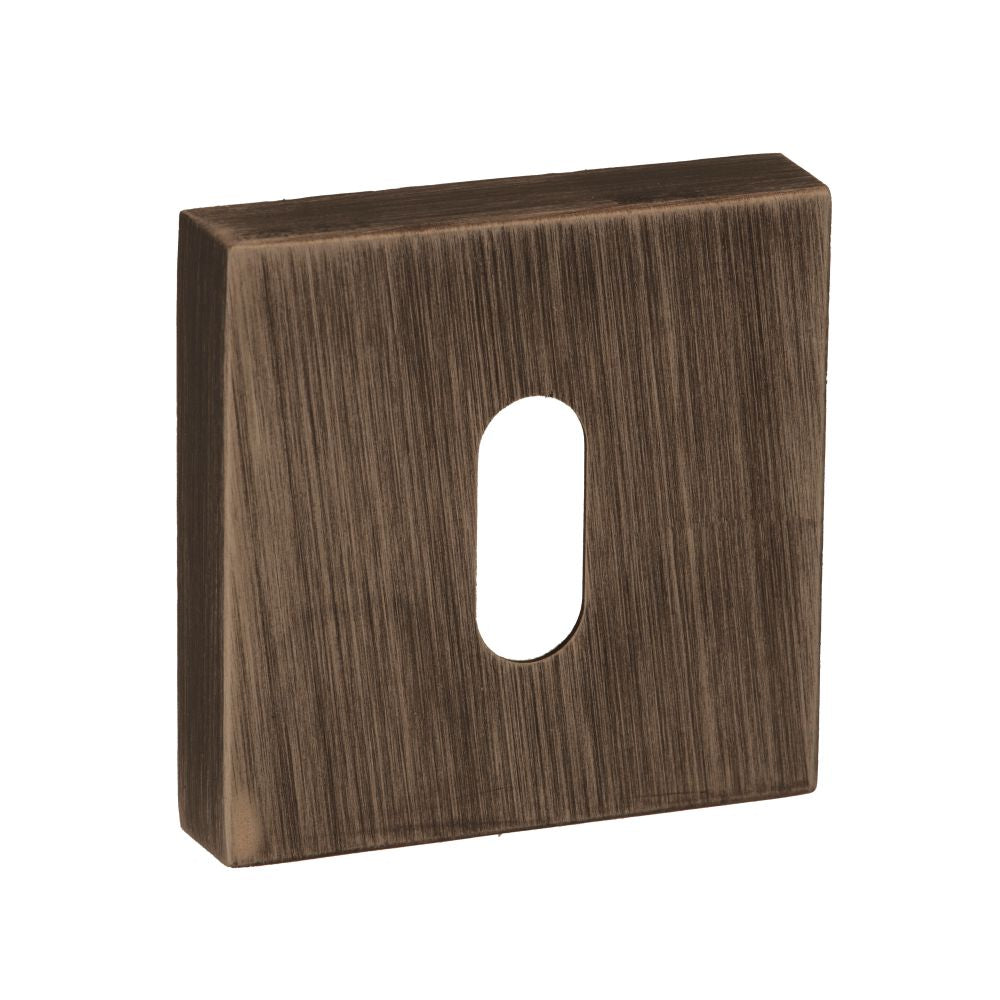 This is an image of Forme Key Escutcheon on Minimal Square Rose - Urban Bronze available to order from T.H Wiggans Architectural Ironmongery in Kendal, quick delivery and discounted prices.