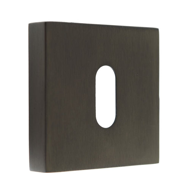 This is an image of Forme Key Escutcheon on Minimal Square Rose - Urban Dark Bronze available to order from T.H Wiggans Architectural Ironmongery in Kendal, quick delivery and discounted prices.