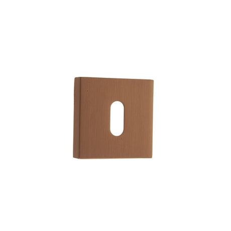 This is an image of Forme Key Escutcheon on Minimal Square Rose - Urban Satin Copper available to order from T.H Wiggans Architectural Ironmongery in Kendal, quick delivery and discounted prices.