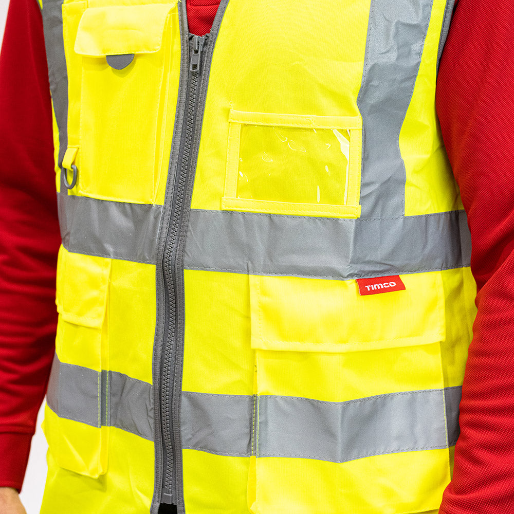 This is an image showing TIMCO Hi-Visibility Executive Vest - Yellow - Large - 1 Each Bag available from T.H Wiggans Ironmongery in Kendal, quick delivery at discounted prices.