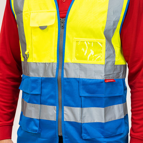 This is an image showing TIMCO Hi-Visibility Executive Vest - Yellow & Blue - XXXX Large - 1 Each Bag available from T.H Wiggans Ironmongery in Kendal, quick delivery at discounted prices.