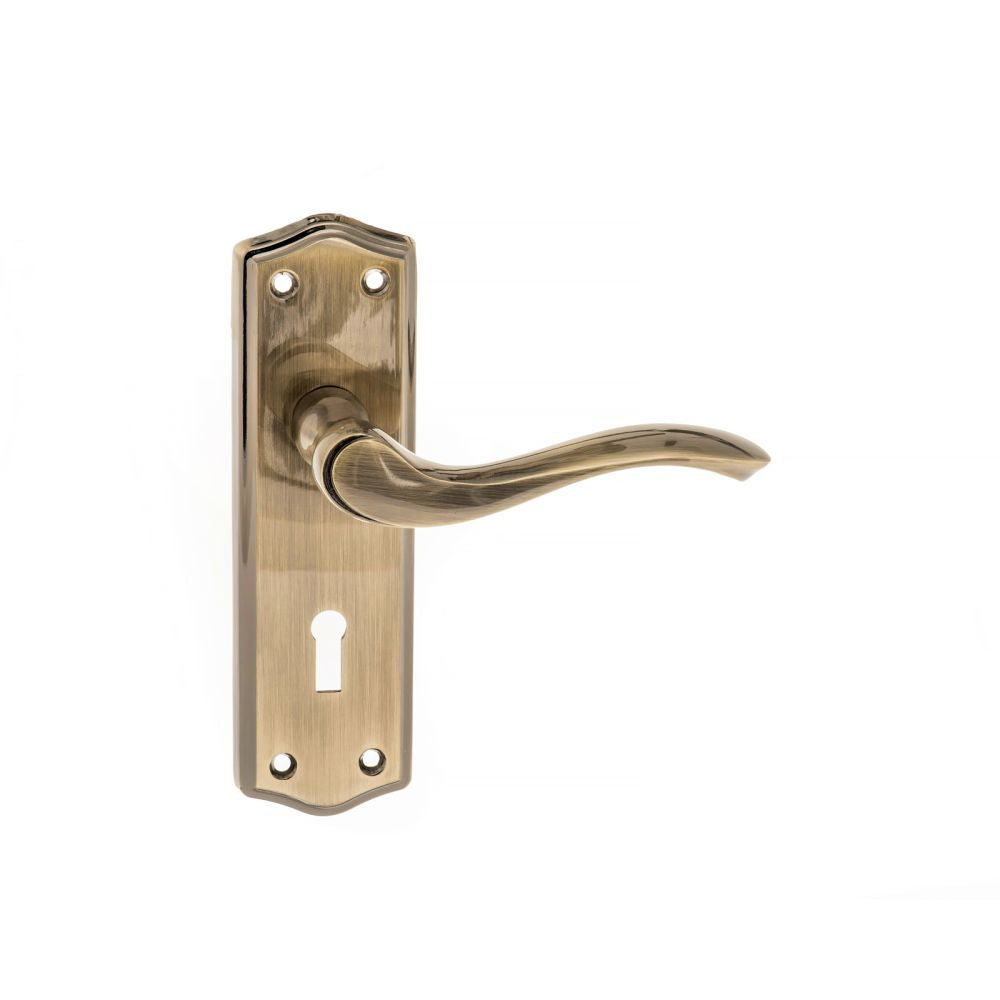 This is an image of Old English Warwick Key Lever on Backplate - Antique Brass available to order from T.H Wiggans Architectural Ironmongery in Kendal, quick delivery and discounted prices.