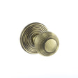 This is an image of Old English Ripon Solid Brass Reeded Mortice Knob on Concealed Fix Rose - Antiqu available to order from T.H Wiggans Architectural Ironmongery in Kendal, quick delivery and discounted prices.