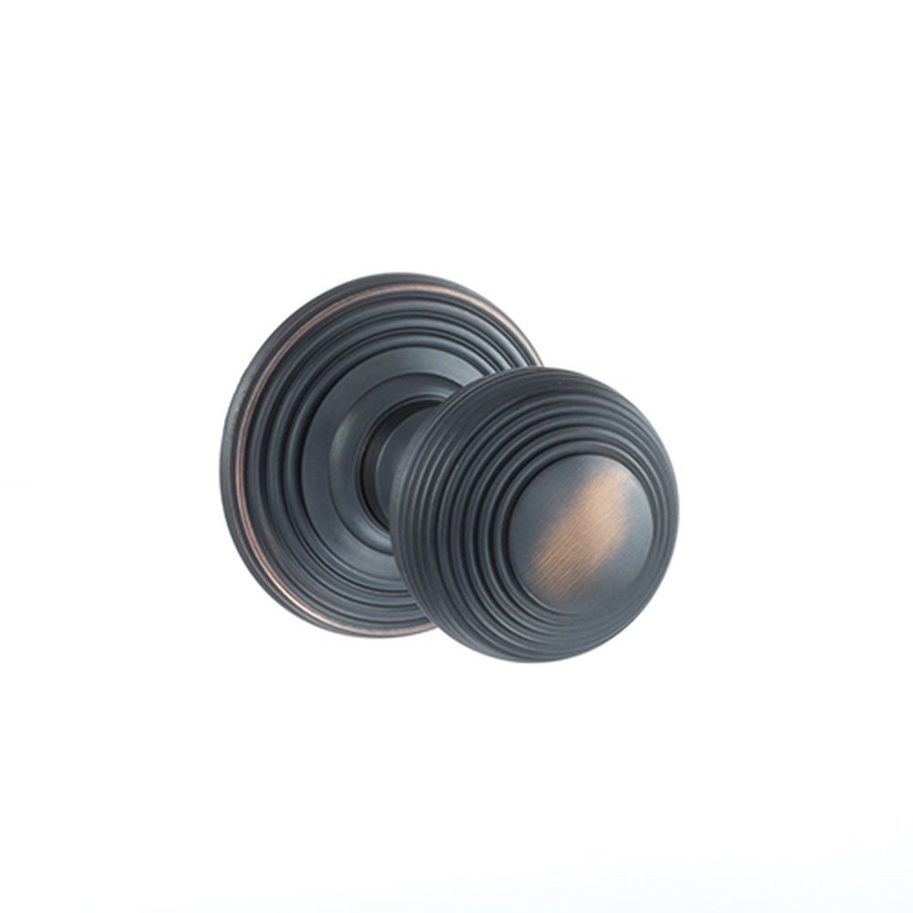 This is an image of Old English Ripon Solid Brass Reeded Mortice Knob on Concealed Fix Rose - Antiqu available to order from T.H Wiggans Architectural Ironmongery in Kendal, quick delivery and discounted prices.