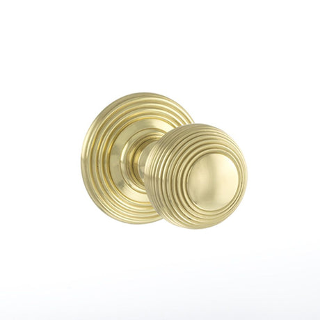 This is an image of Old English Ripon Solid Brass Reeded Mortice Knob on Concealed Fix Rose - Polish available to order from T.H Wiggans Architectural Ironmongery in Kendal, quick delivery and discounted prices.