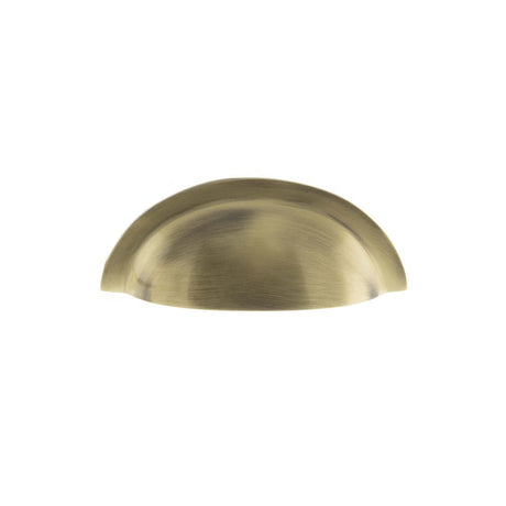This is an image of Old English Winchester Solid Brass Cabinet Cup Pull Concealed Fix - Ant. Brass available to order from Trade Door Handles.