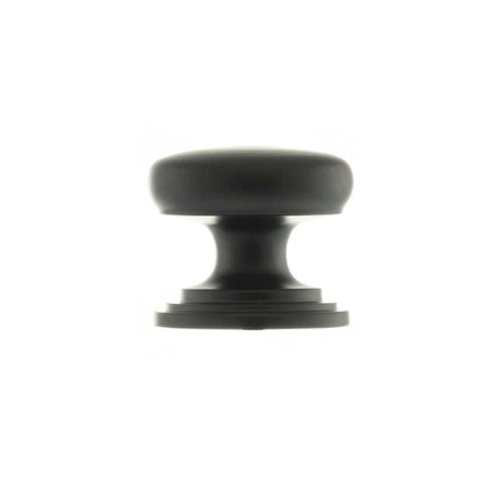 This is an image of Old English Lincoln Solid Brass Cabinet Knob 32mm Concealed Fix - Matt Black available to order from Trade Door Handles.