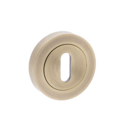 This is an image of Old English Key Escutcheon - Matt Antique Brass available to order from T.H Wiggans Architectural Ironmongery in Kendal, quick delivery and discounted prices.