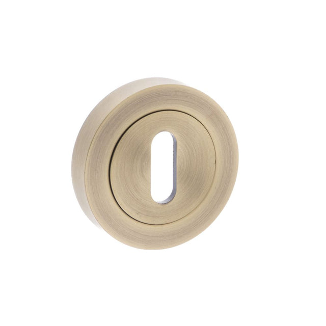 This is an image of Old English Key Escutcheon - Matt Antique Brass available to order from T.H Wiggans Architectural Ironmongery in Kendal, quick delivery and discounted prices.