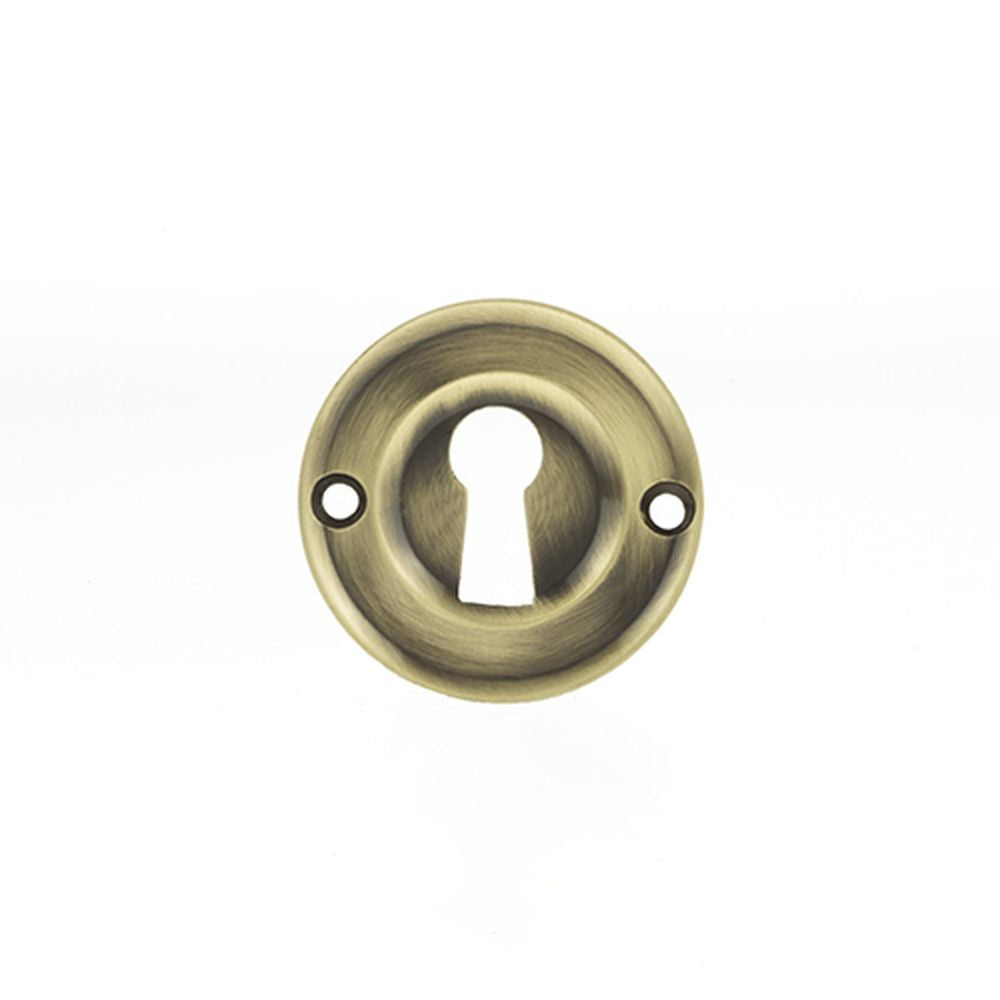 This is an image of Old English Solid Brass Open Key Hole Escutcheon - Antique Brass available to order from T.H Wiggans Architectural Ironmongery in Kendal, quick delivery and discounted prices.