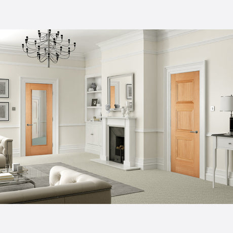 This is an image showing LPD - Amsterdam Pre-Finished Oak Doors 610 x 1981 available from T.H Wiggans Ironmongery in Kendal, quick delivery at discounted prices.