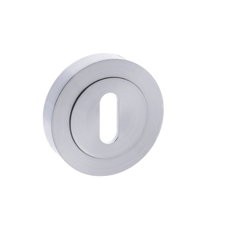 This is an image of STATUS Key Escutcheon on Round Rose - Satin Chrome available to order from T.H Wiggans Architectural Ironmongery in Kendal, quick delivery and discounted prices.